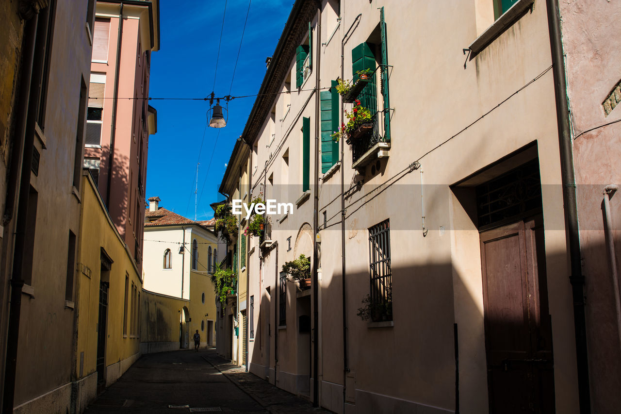 Alley amidst residential buildings