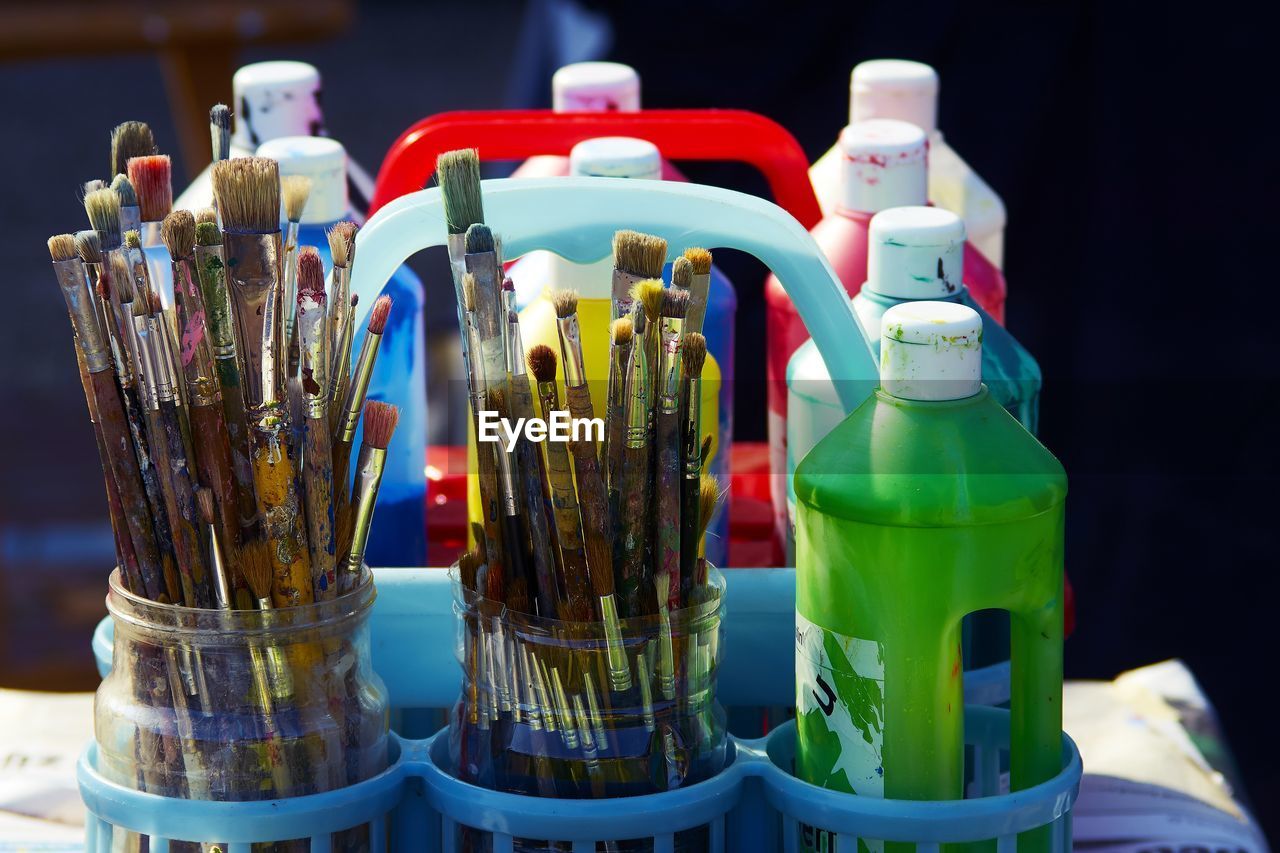 Close-up of watercolor paints on table