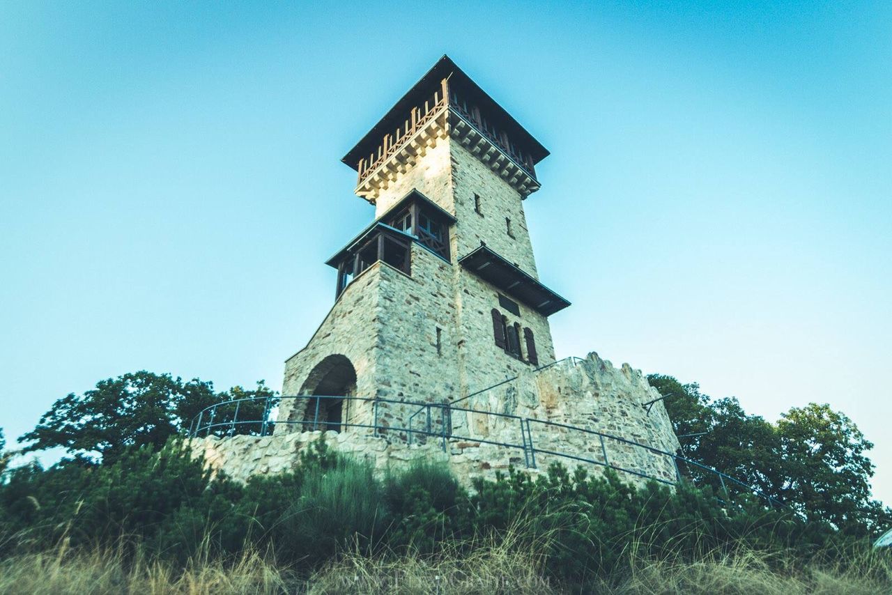 LOW ANGLE VIEW OF TOWER AGAINST CLEAR SKY