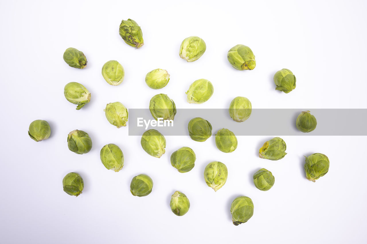 green, healthy eating, food, food and drink, wellbeing, vegetable, produce, freshness, plant, studio shot, leaf, no people, indoors, fruit, large group of objects, directly above, yellow, still life, organic, flower, nature, brussels sprout