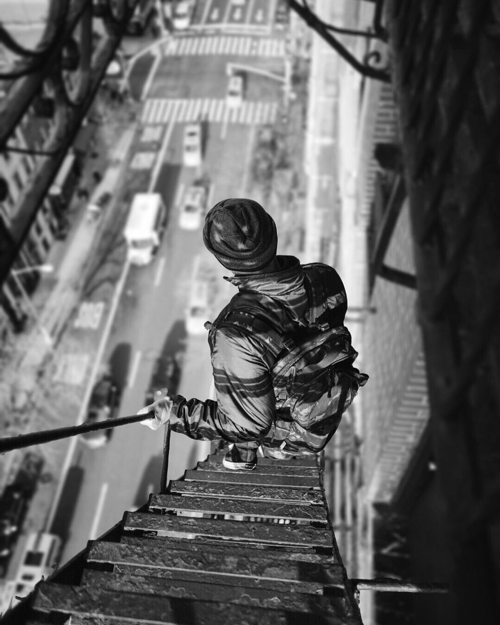 High angle view of man on fire escape