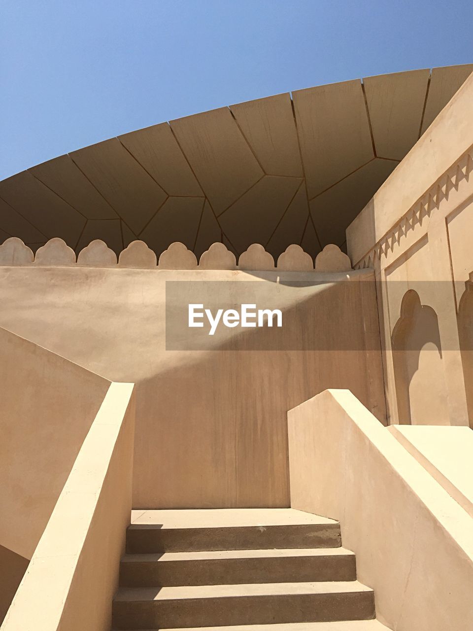 Low angle view of staircase against sky