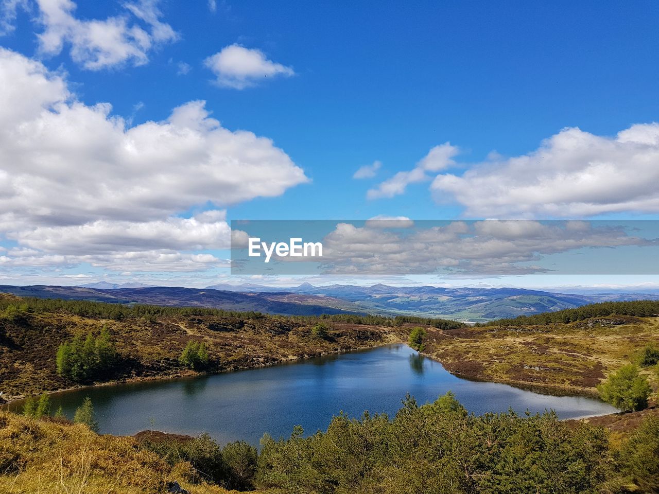 Scenic view of river against sky