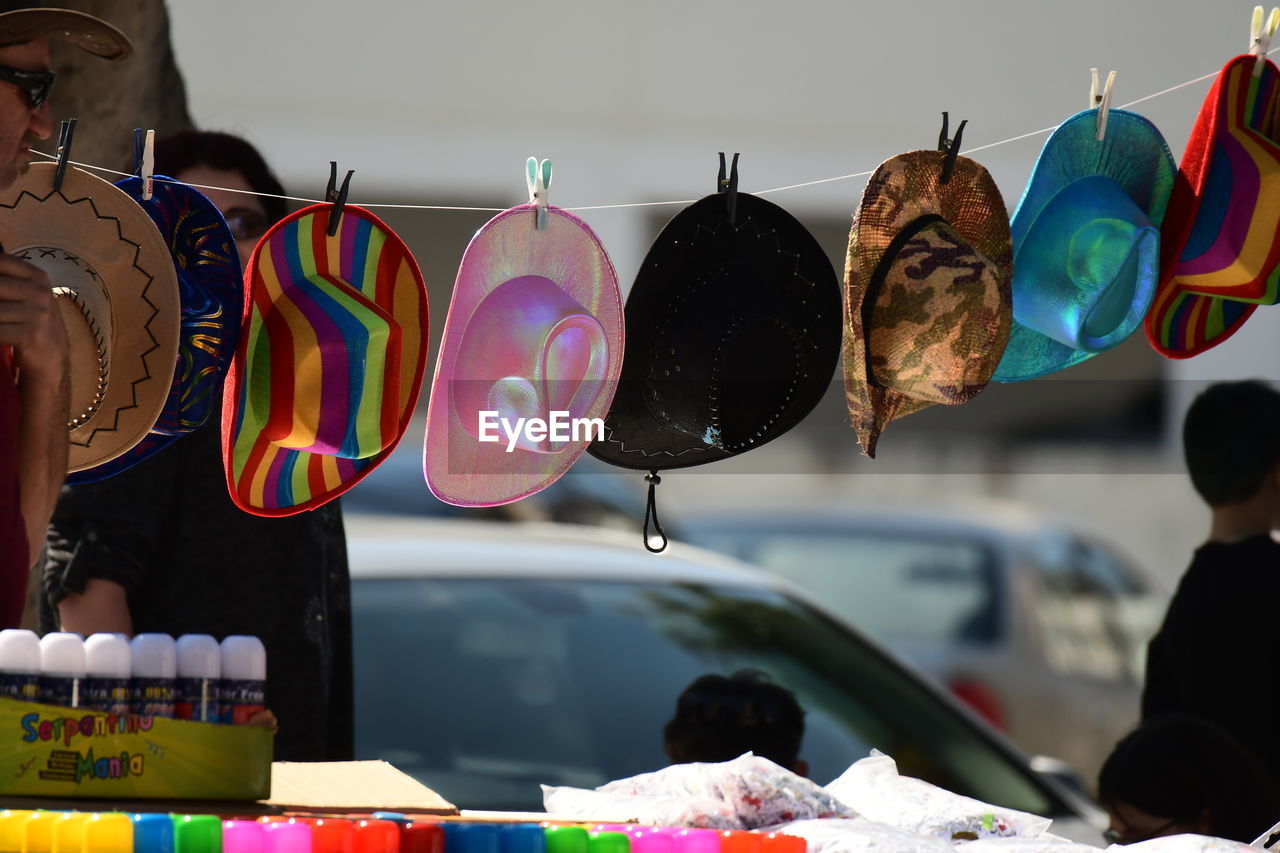 CLOSE-UP OF MULTI COLORED BALLOONS IN MARKET