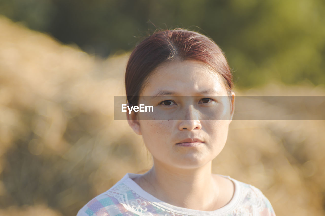 Portrait of woman during sunny day