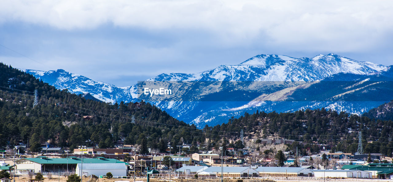 Scenic view of mountains against sky during winter