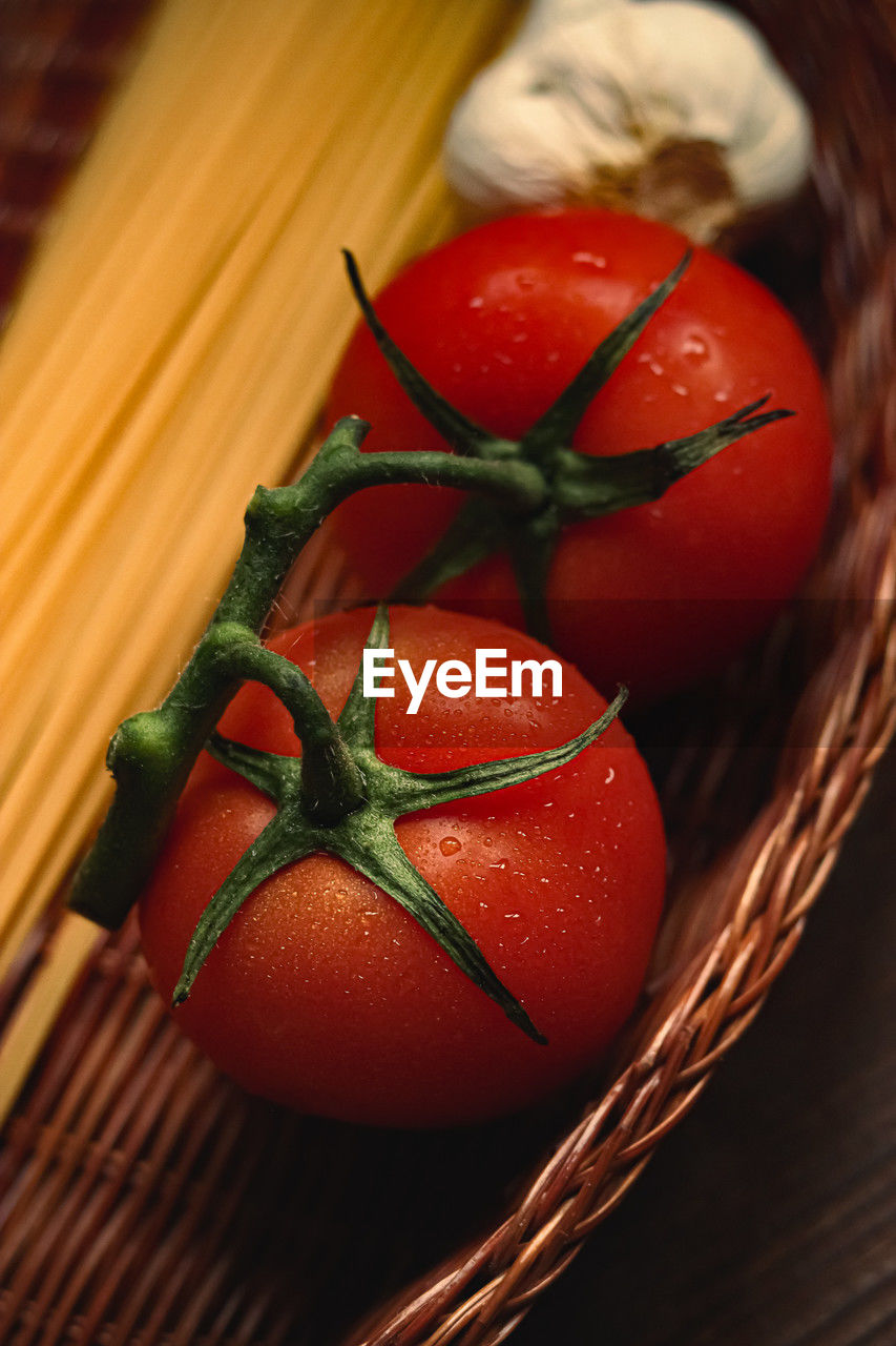 close-up of tomatoes on wooden table
