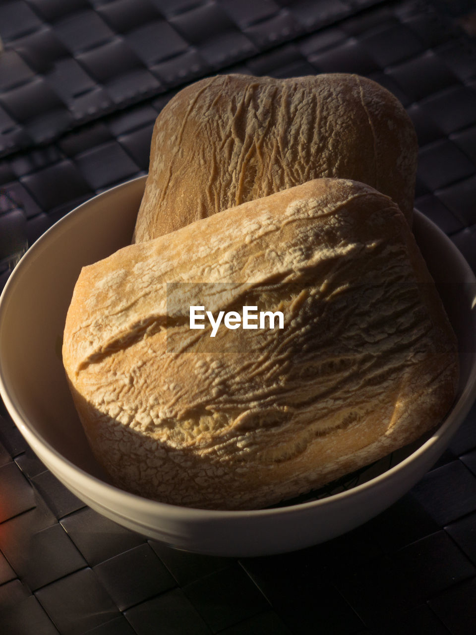 CLOSE UP OF BREAD IN CONTAINER