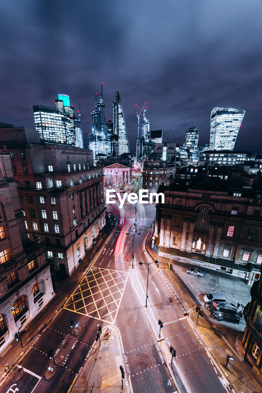 High angle view of road in illuminated city at night