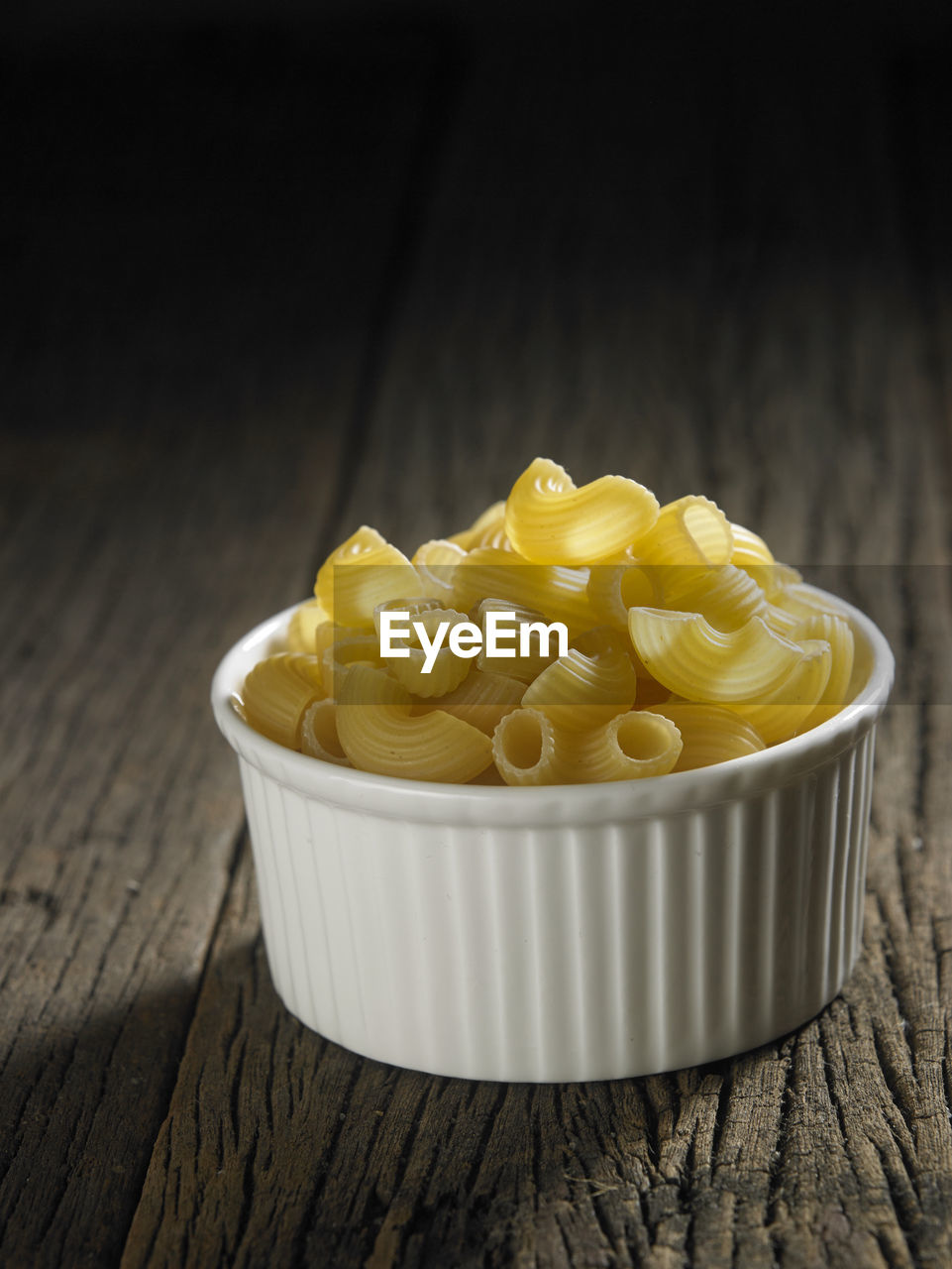 Close-up of macaroni pasta on table