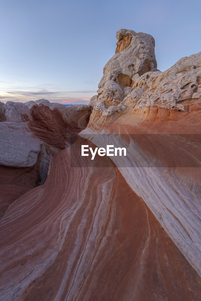 Natural rough rocky formations of brown and white colors in vermillion cliffs national monument in arizona state