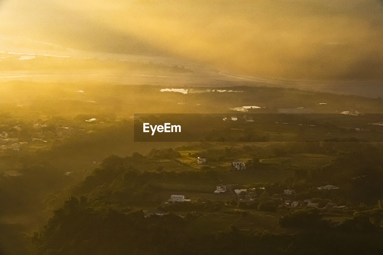 SCENIC VIEW OF LANDSCAPE AGAINST SKY DURING SUNSET