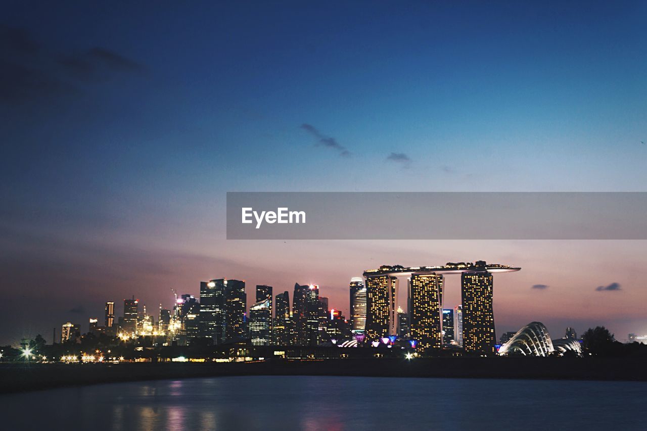 Illuminated marina bay sands during twilight