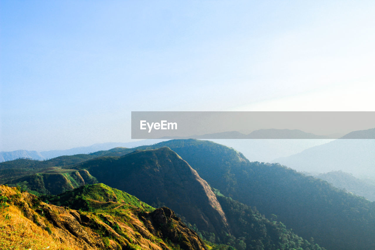 Scenic view of mountains against clear sky