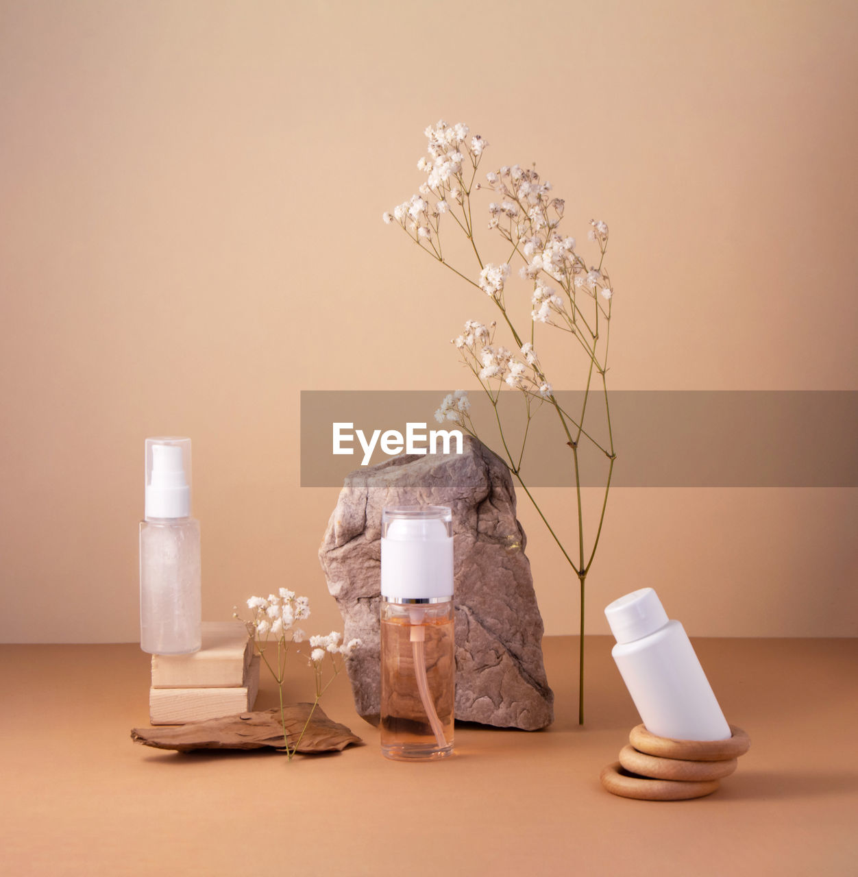 A set of cosmetics with natural materials on a light background. wabi sabi trend