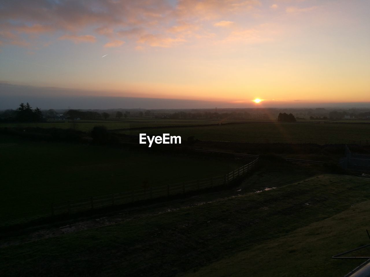 RURAL LANDSCAPE AGAINST SKY DURING SUNSET