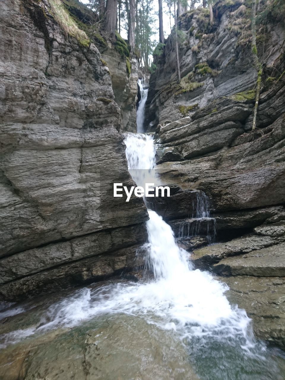 WATER SPLASHING ON ROCKS