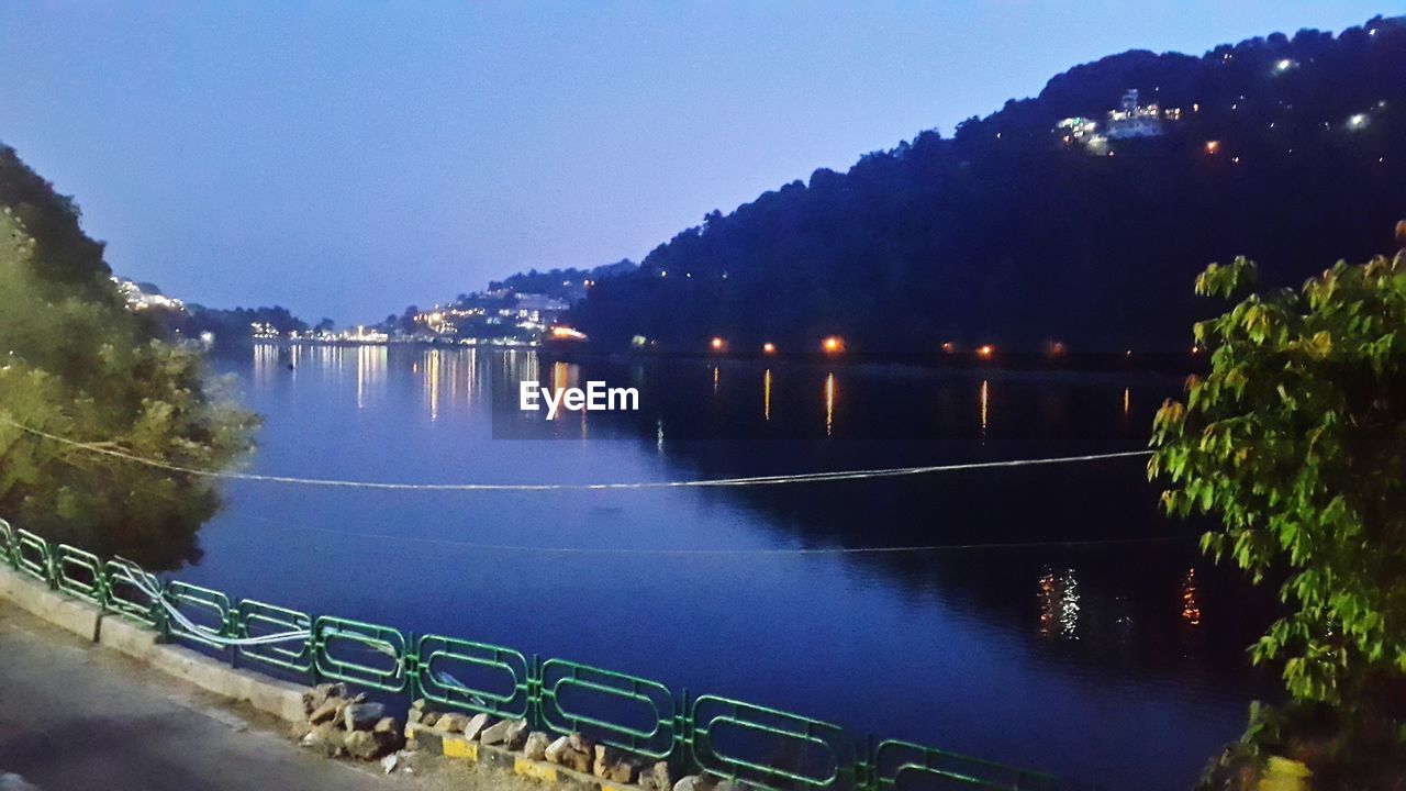 SCENIC VIEW OF LAKE AT NIGHT