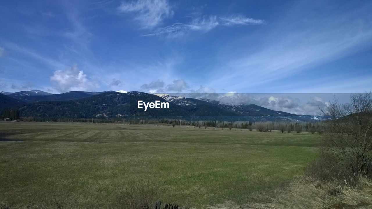 View of landscape against cloudy sky