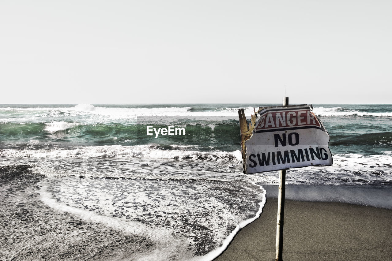 WARNING SIGN ON BEACH