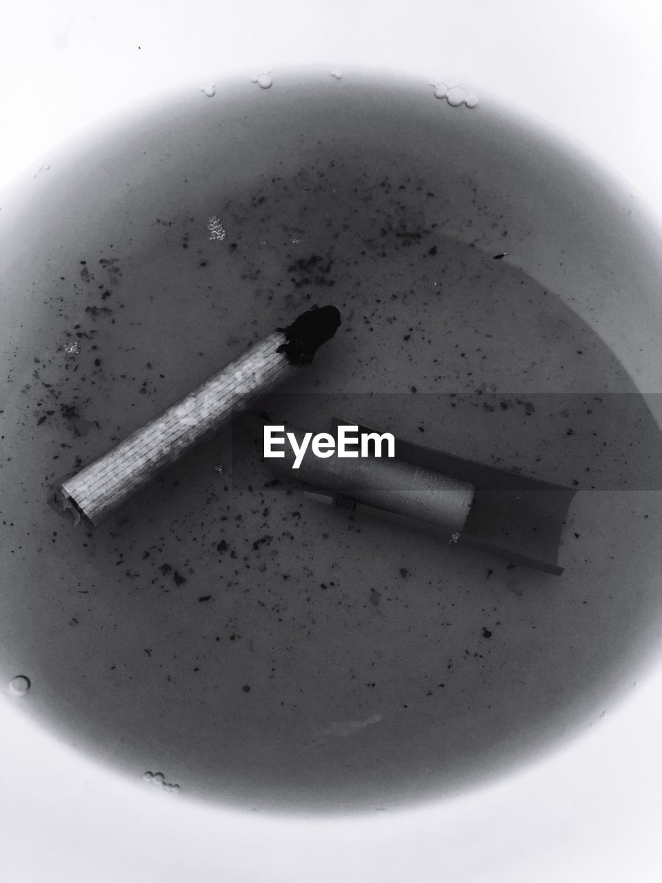 High angle view of cigarettes in ashtray