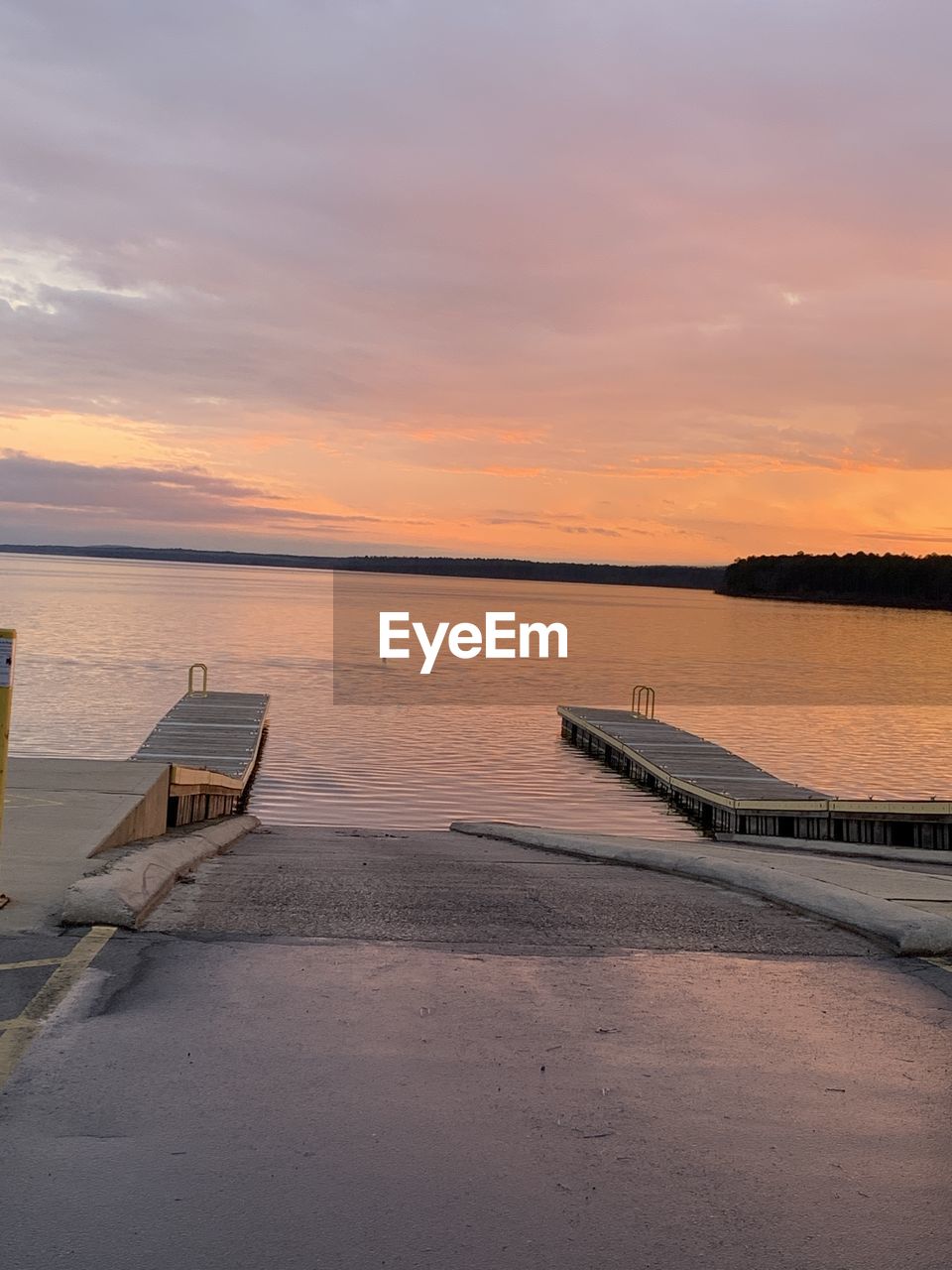 SCENIC VIEW OF BEACH DURING SUNSET