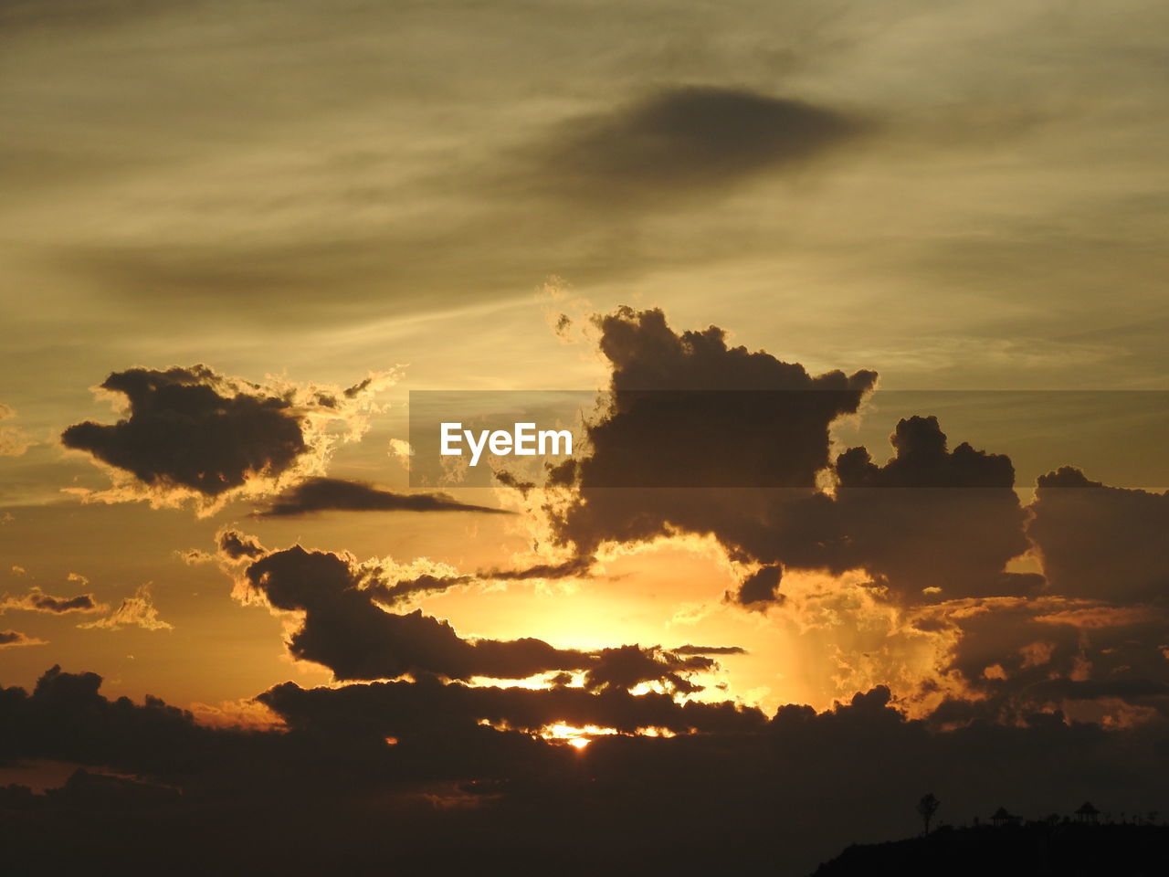 LOW ANGLE VIEW OF DRAMATIC SKY OVER SILHOUETTE LANDSCAPE