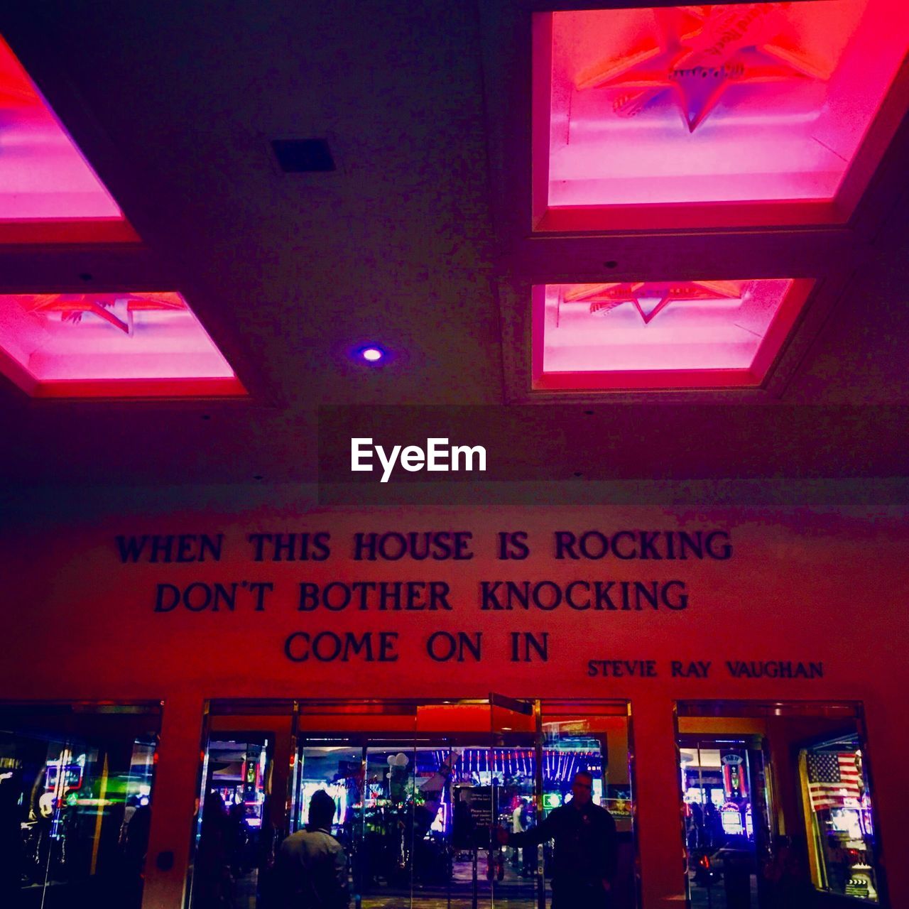 TEXT IN ILLUMINATED CITY