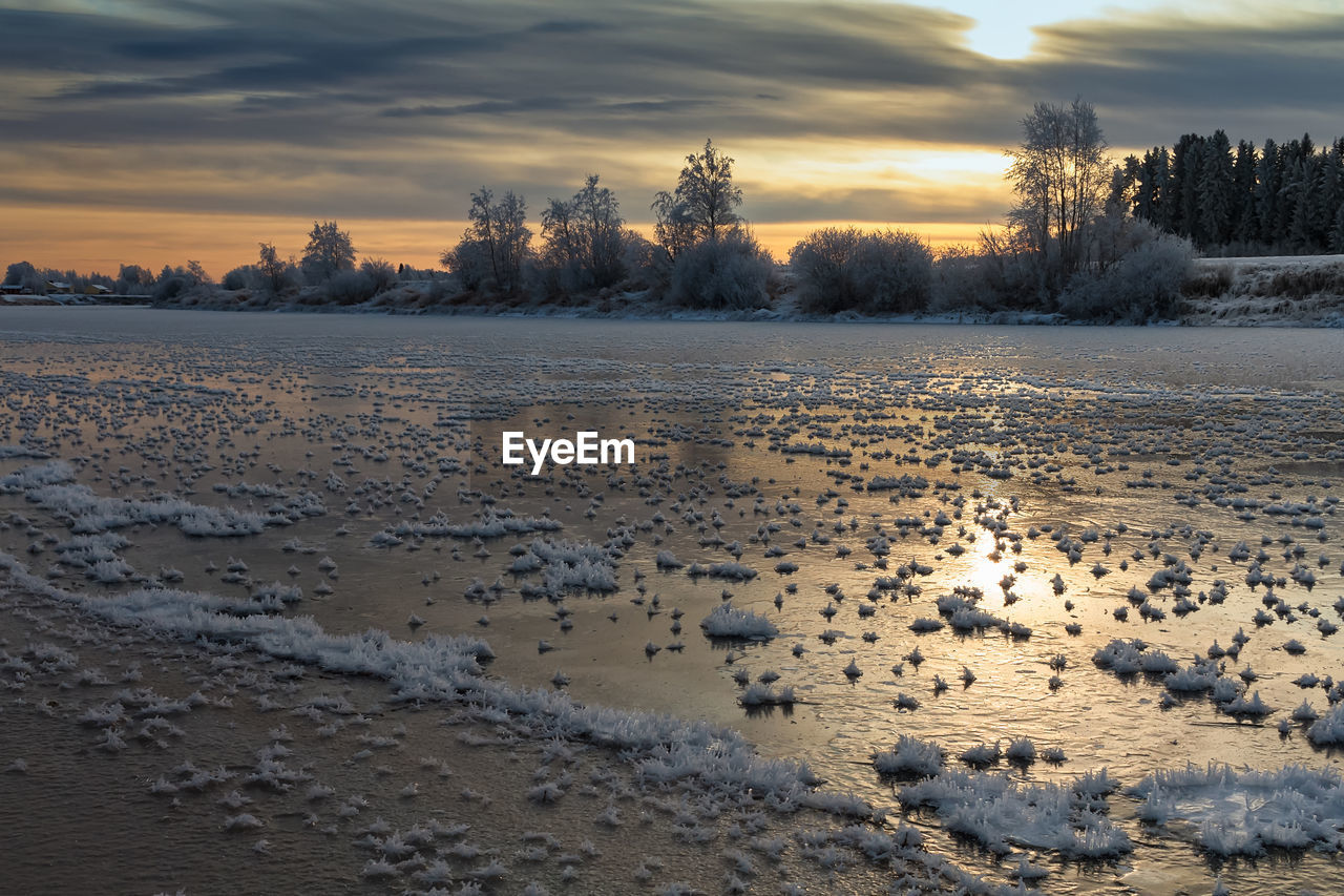 The river is slowly freezing at the northern finland. 