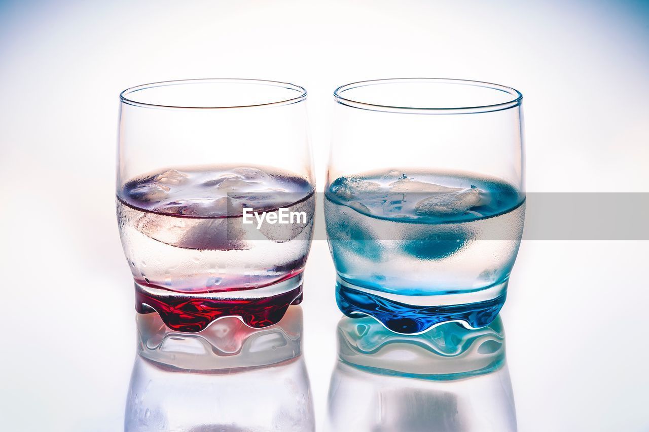 Close-up of drinks in glasses on table