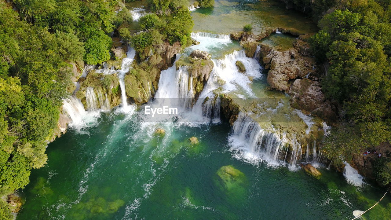 High angle view of waterfall in forest