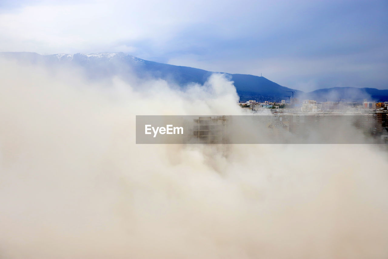 SCENIC VIEW OF MOUNTAIN AGAINST SKY DURING FOGGY WEATHER