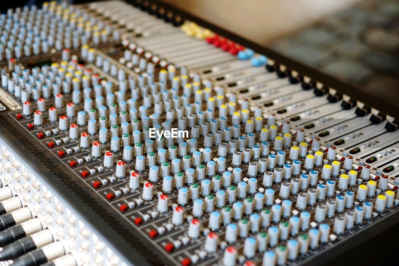 High angle close-up of sound mixer at studio