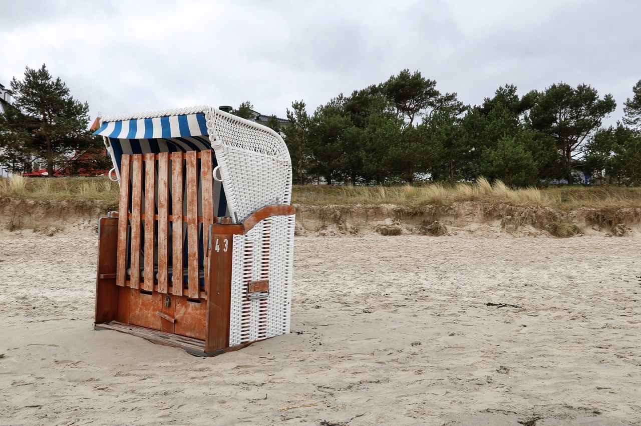 Hooded chairs on beach