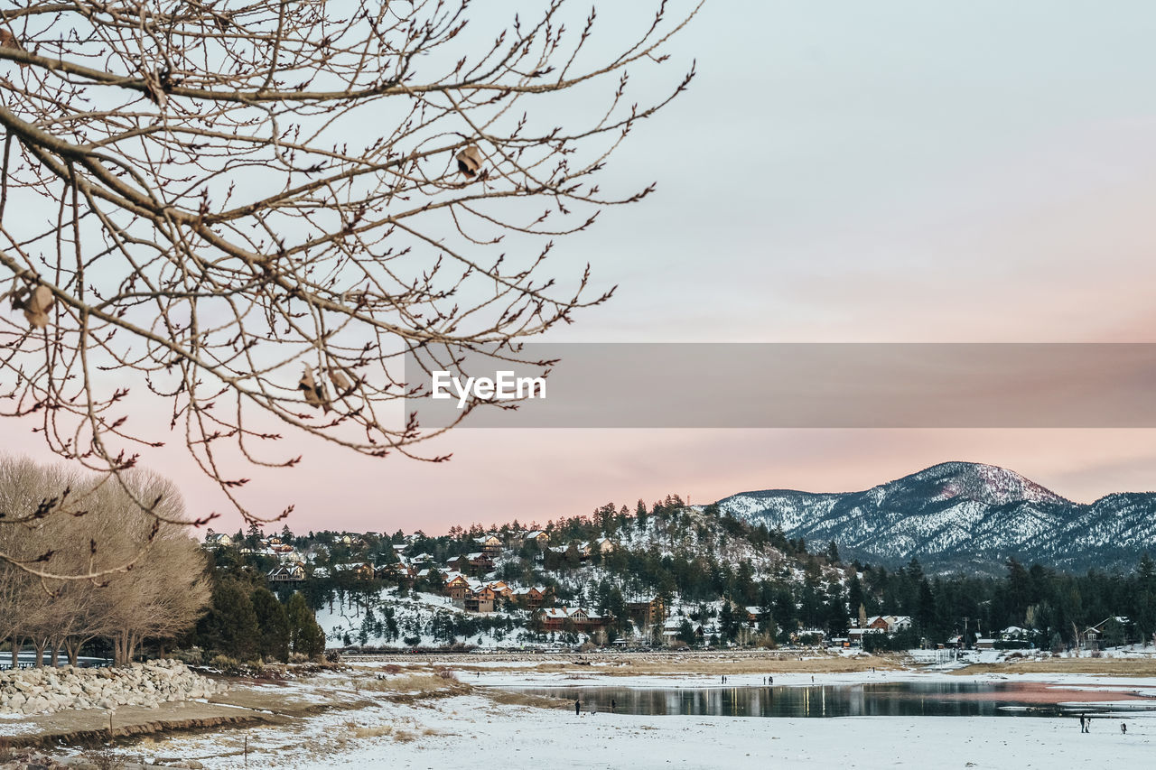 Scenic view of snowcapped mountains against sky during winter