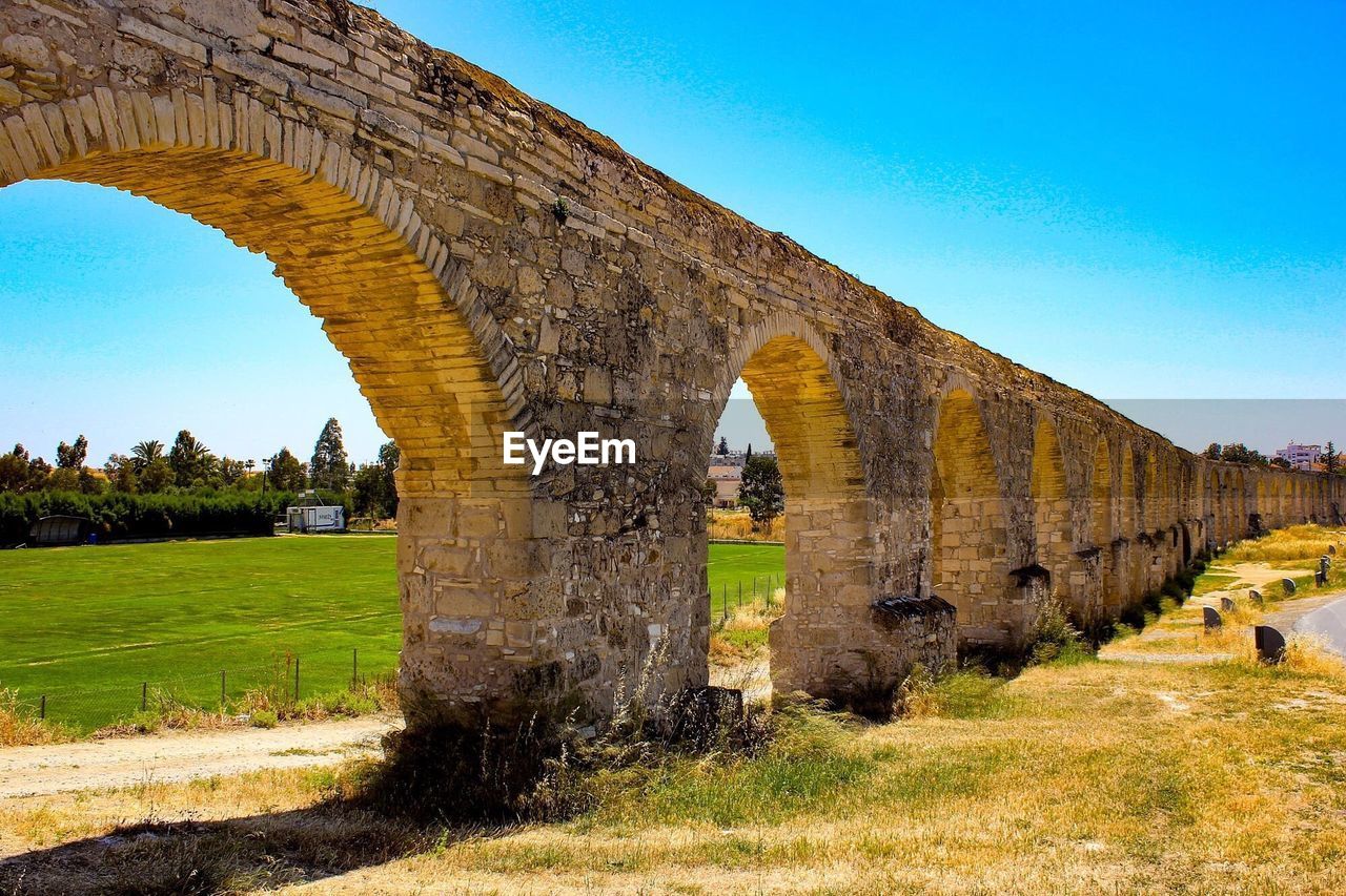 View of old ruin against clear blue sky