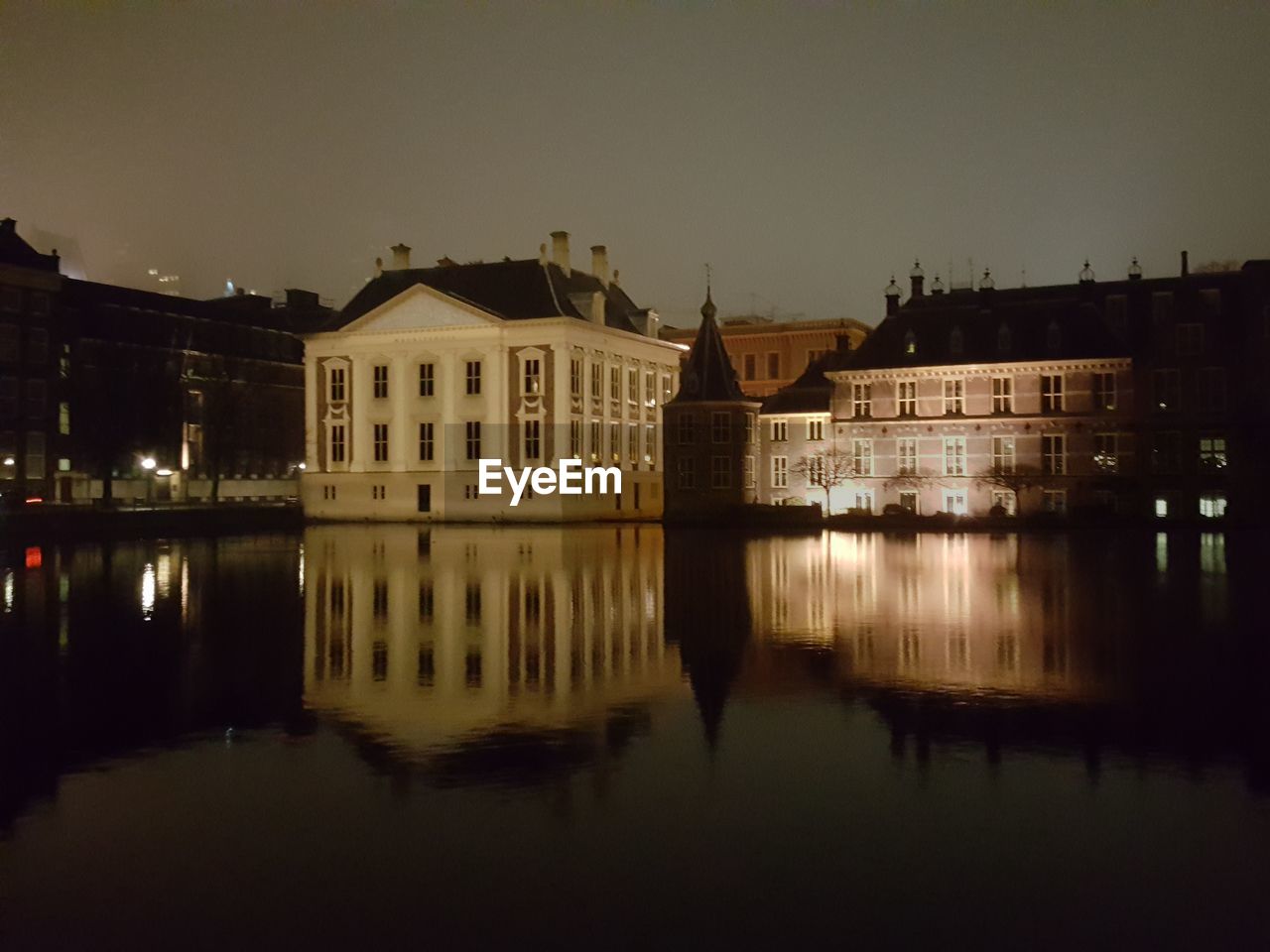 REFLECTION OF BUILDING IN WATER