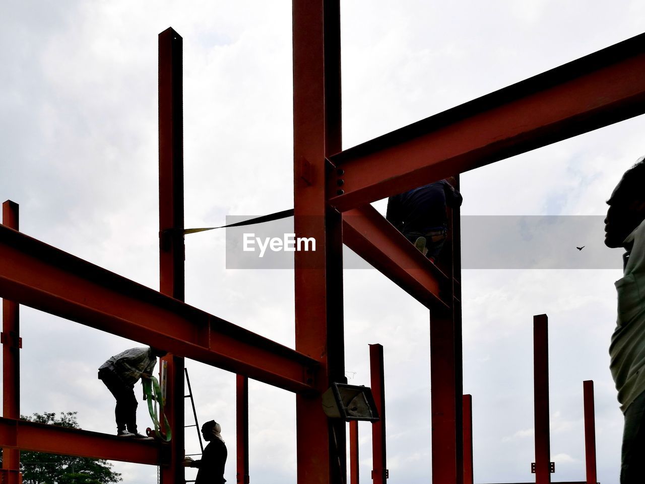 LOW ANGLE VIEW OF CHILD IN SKY