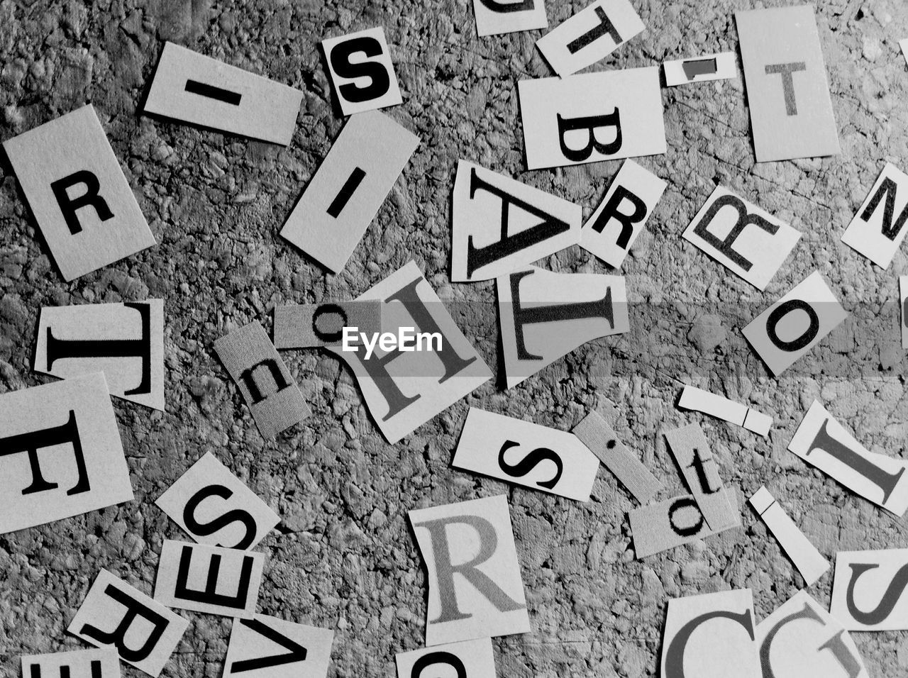 High angle view of various alphabet letters on floor