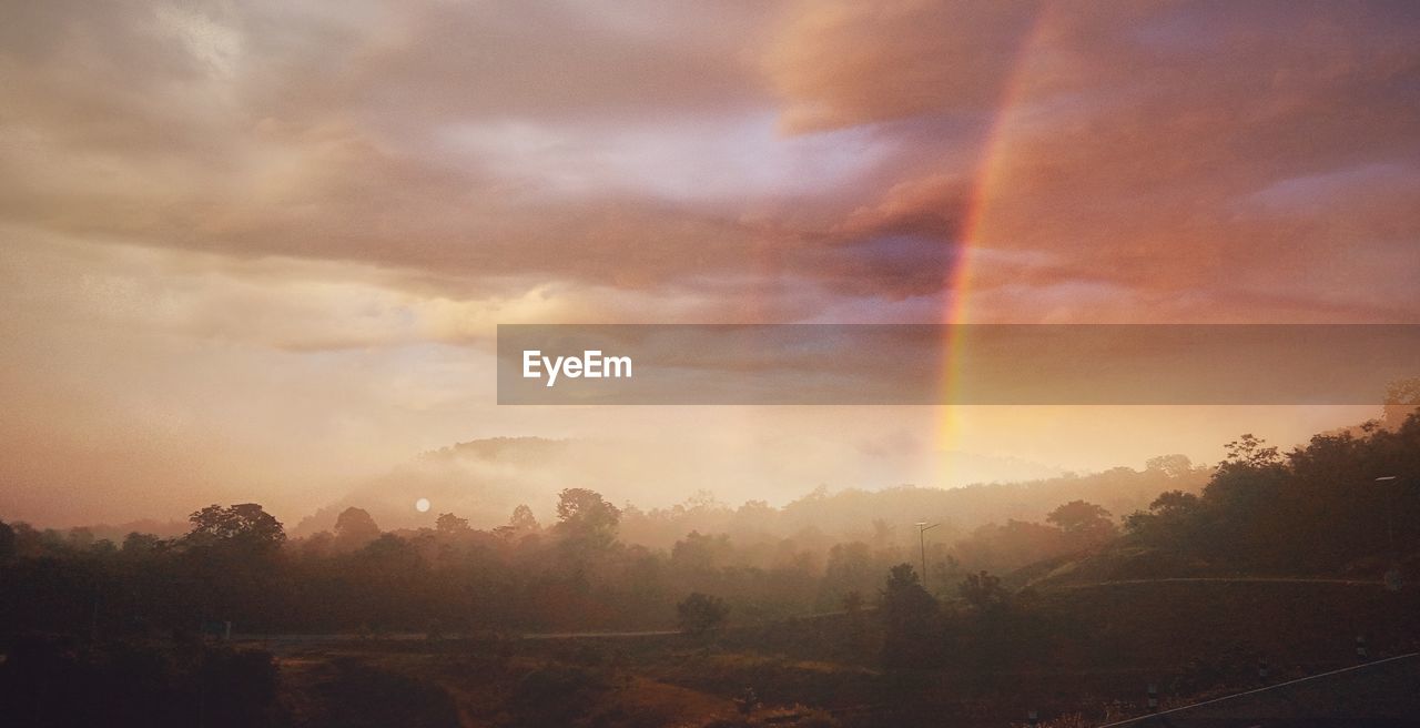 SCENIC VIEW OF RAINBOW AGAINST SKY