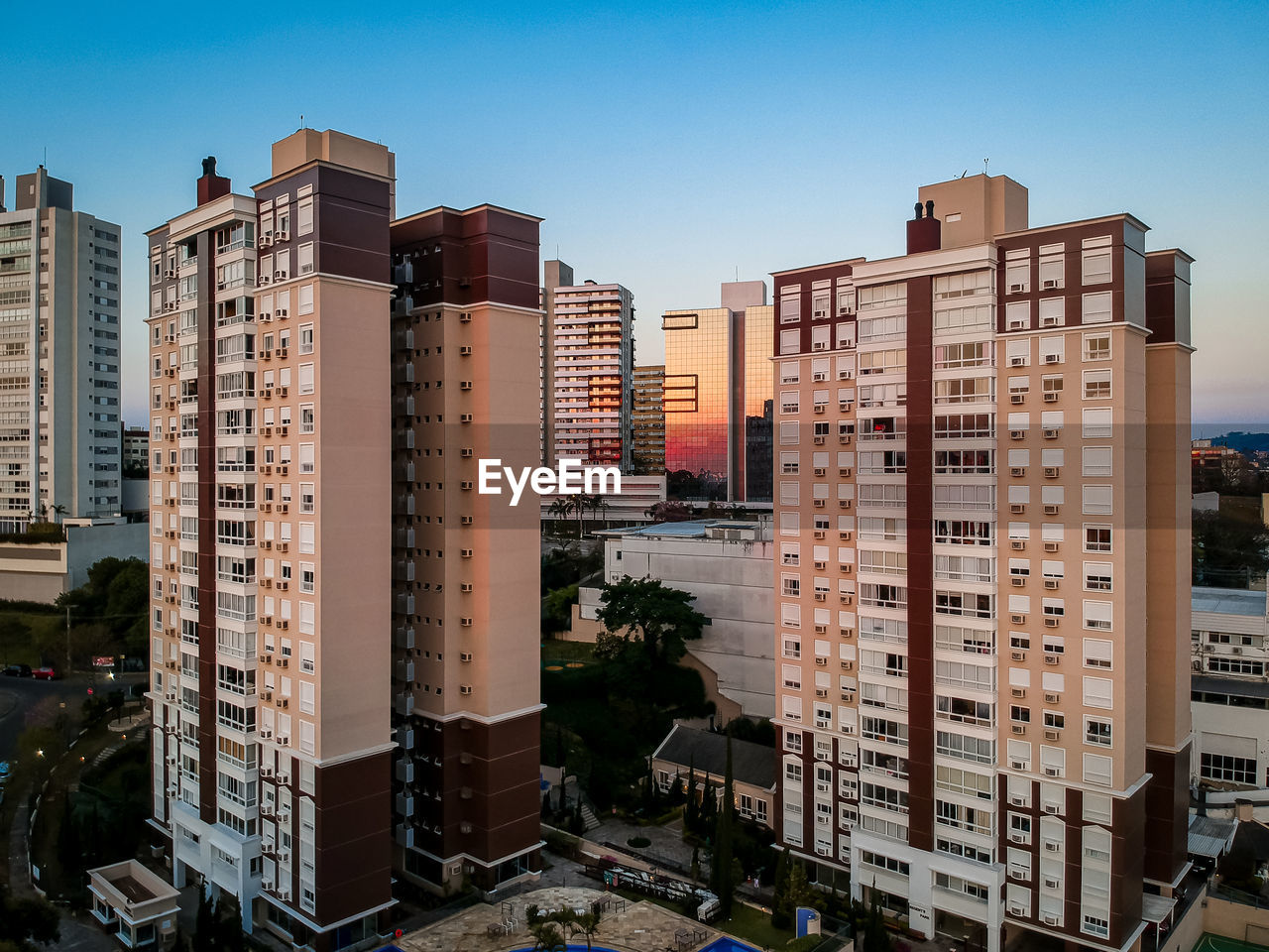 High angle view of buildings in city against sky