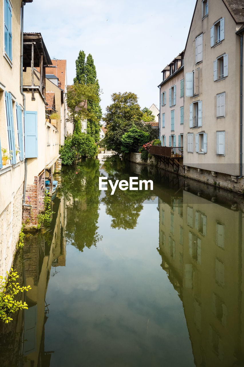 Reflection of houses on water