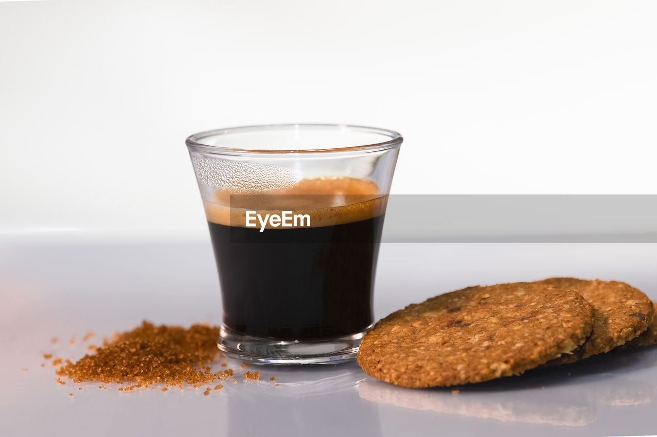 CLOSE-UP OF COFFEE ON TABLE