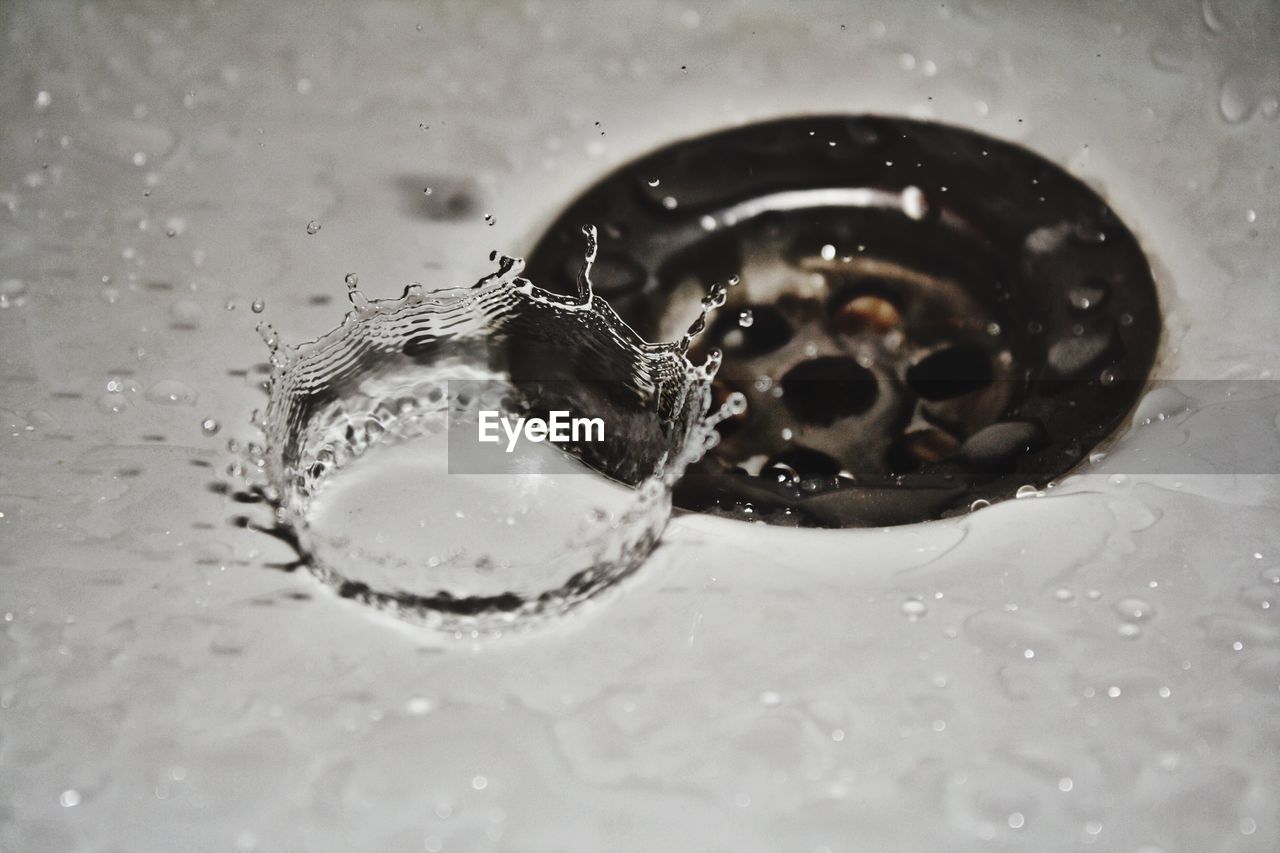 High angle view of water splashing in sink