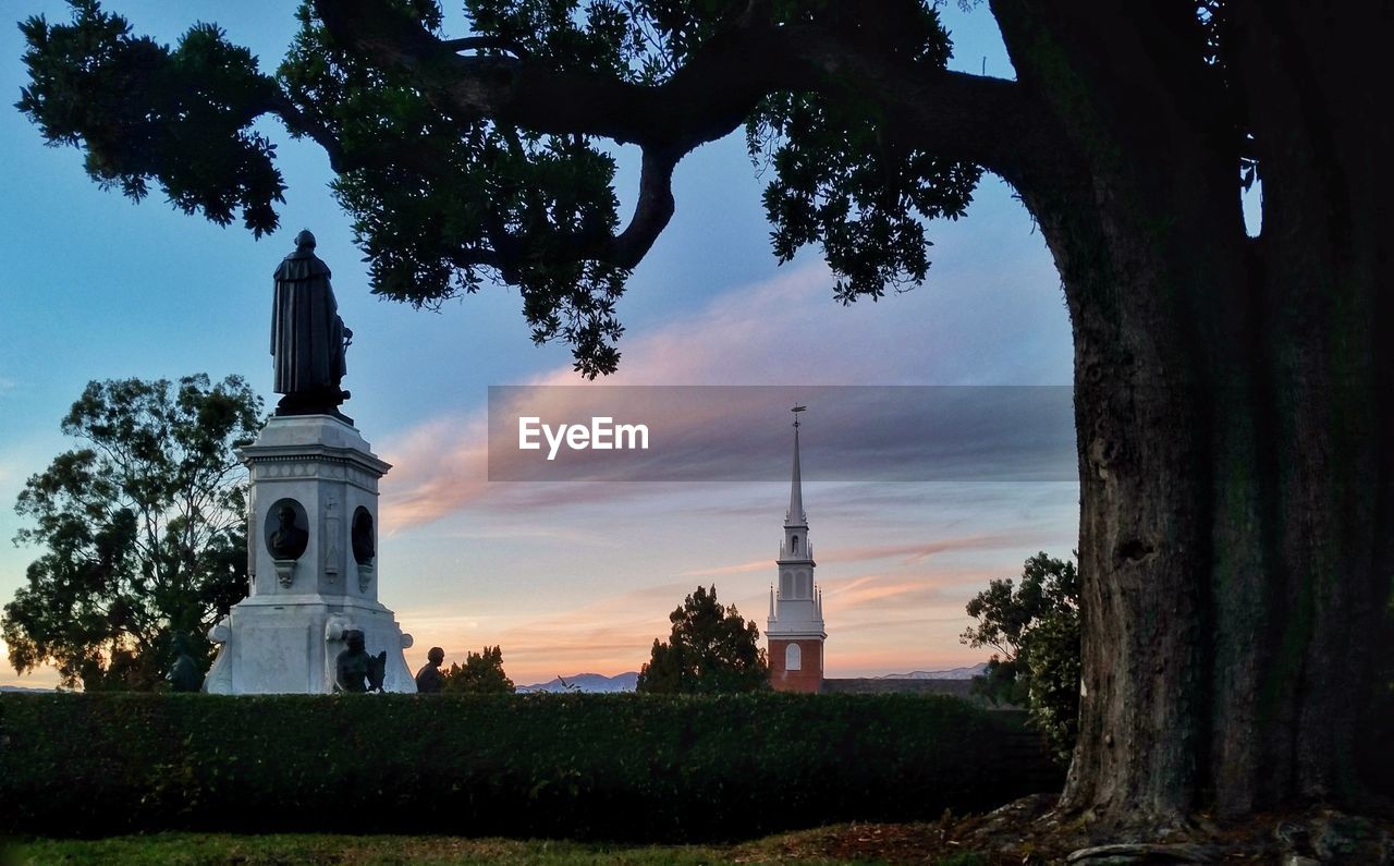 VIEW OF TOWER AT SUNSET