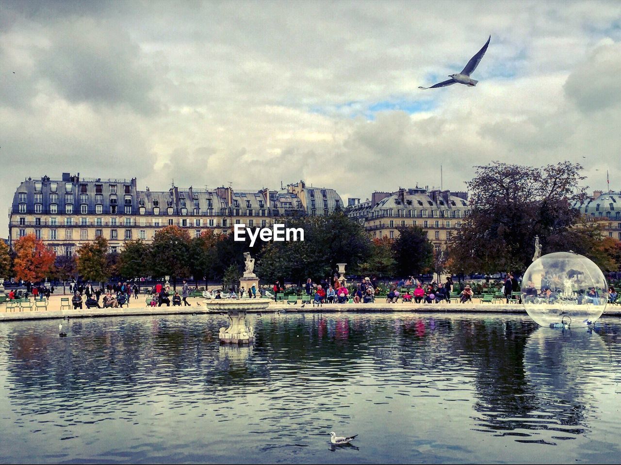 CROWD FLYING OVER WATER