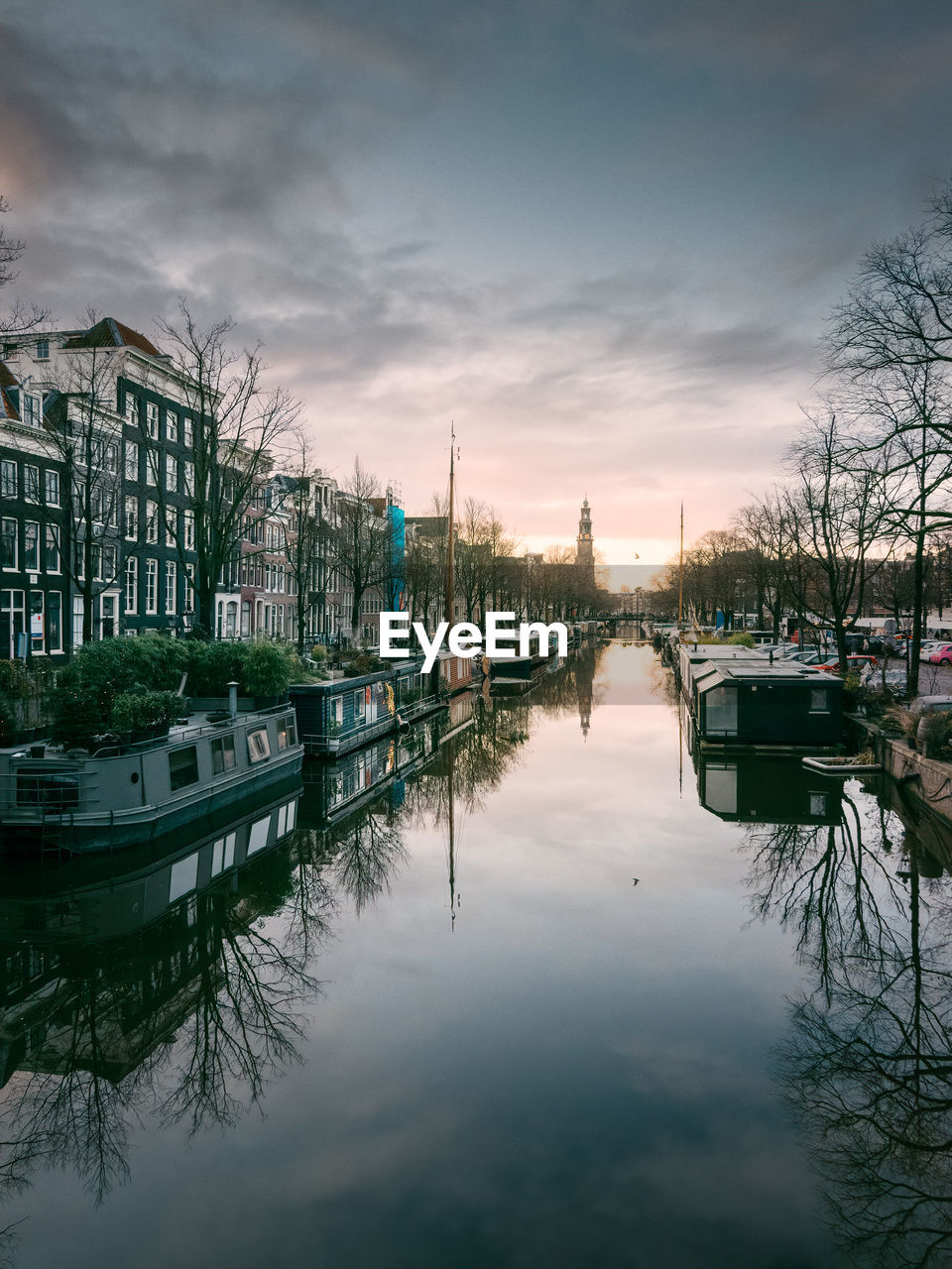 Prinsengracht canal view towards westerkerk from the lekkeresluis bridge