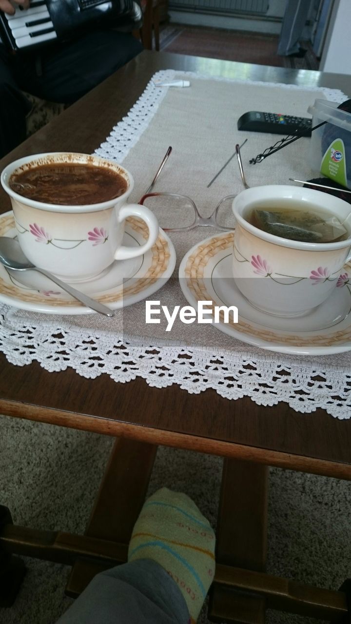 COFFEE CUP ON TABLE