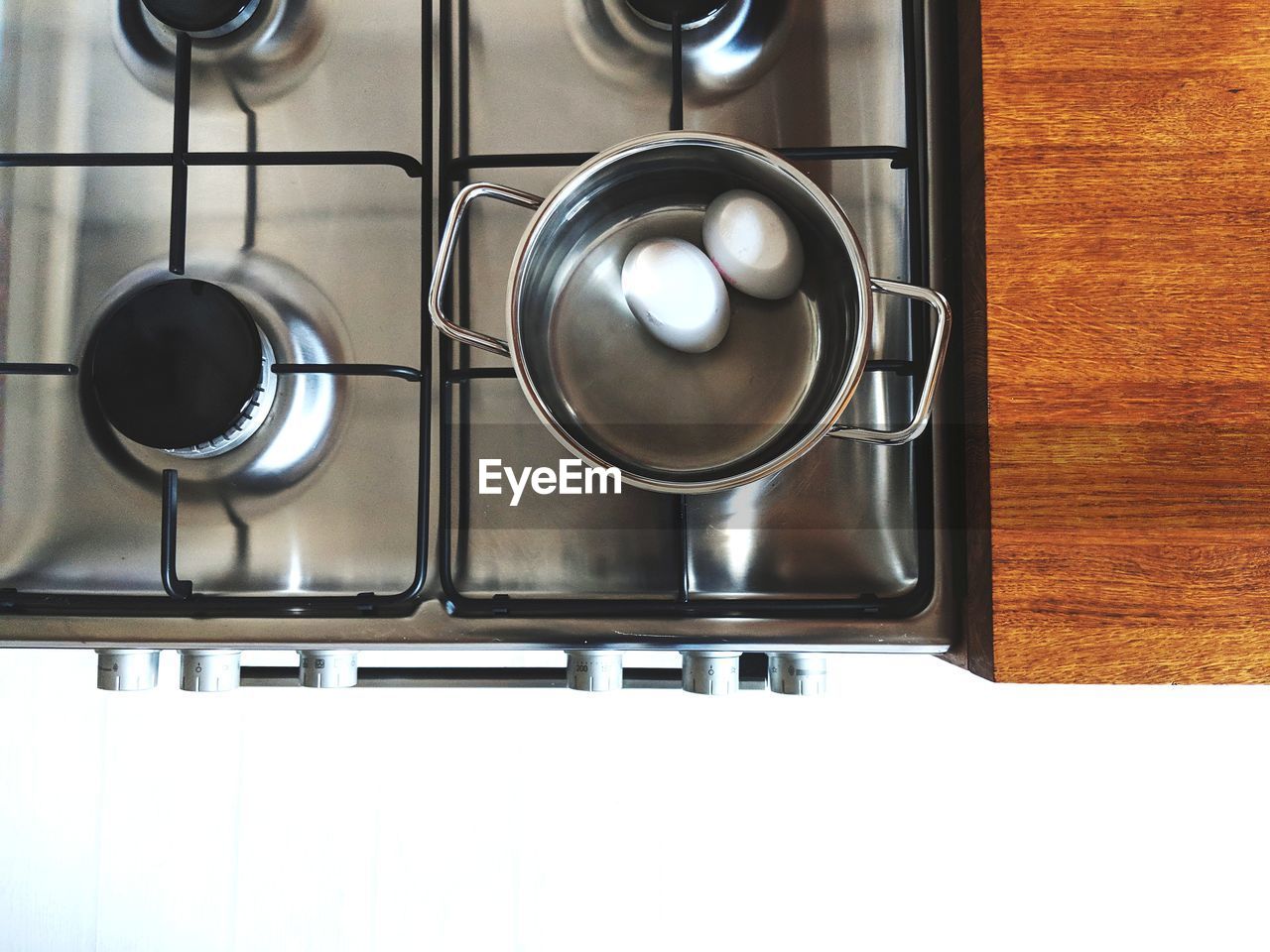 Close-up of boiled eggs in container at kitchen