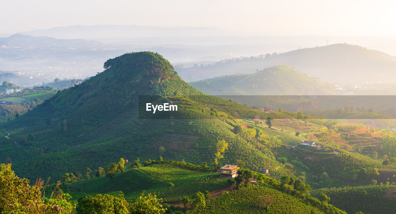 Scenic view of mountains in sunshine early morning in bao loc town, lam dong province, vietnam